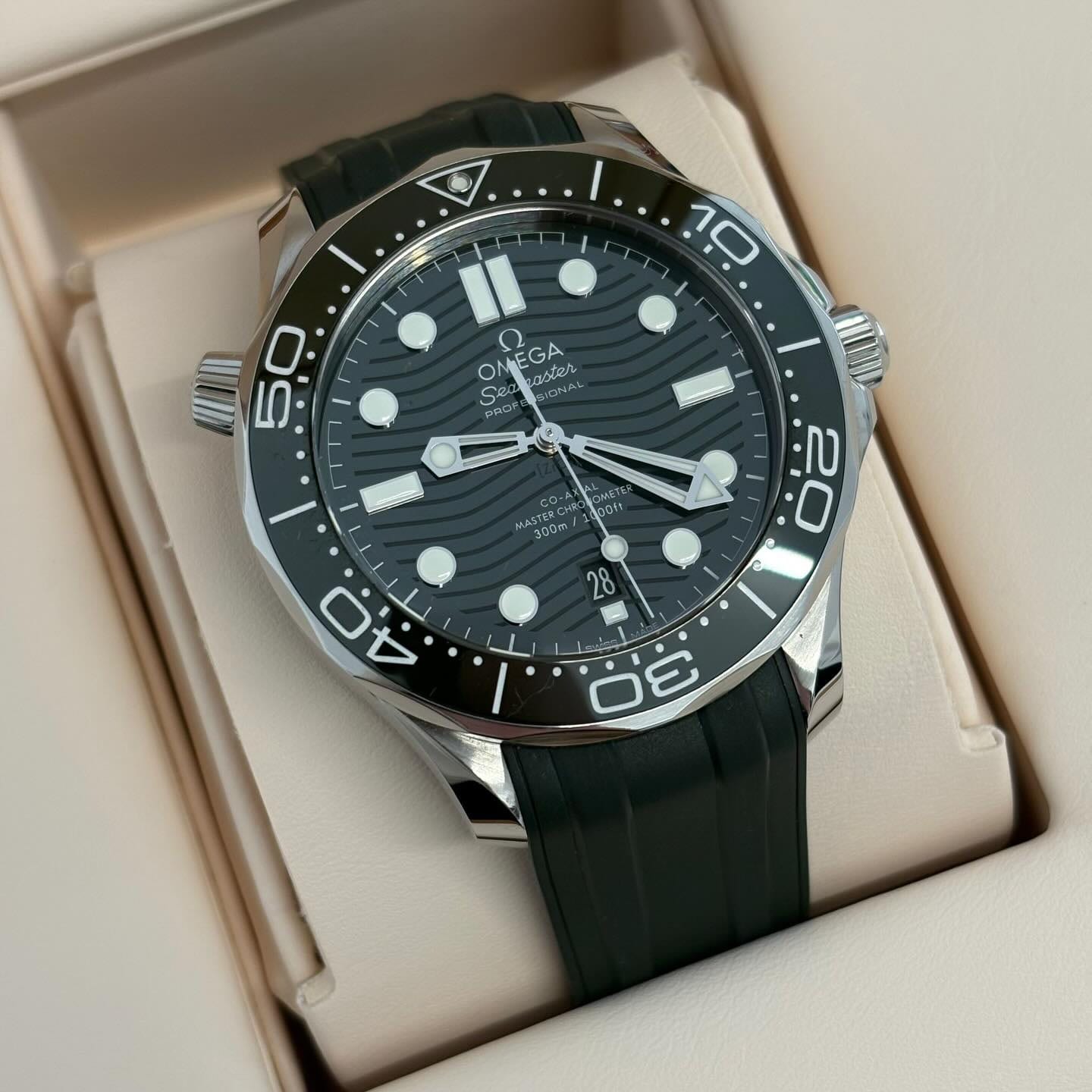 An Omega Seamaster Diver 300M presented in its box